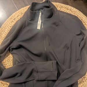 Lululemon define jacket size 6 waist length and I never wore it.